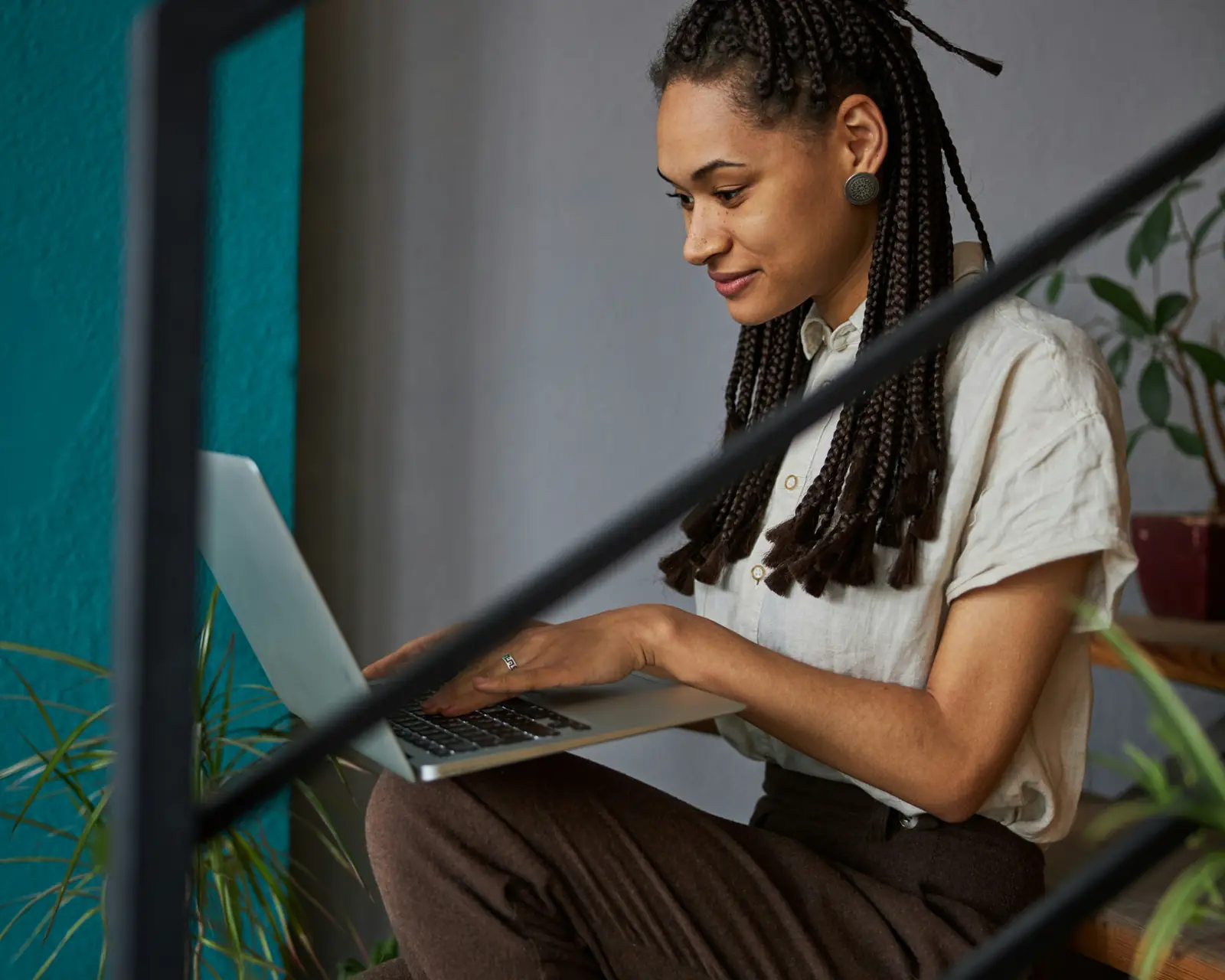 A remote professional working on a laptop.